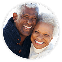 Older couple with diabetic retinopathy smiling