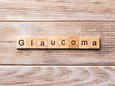 Wood letter tiles spelling out Glaucoma